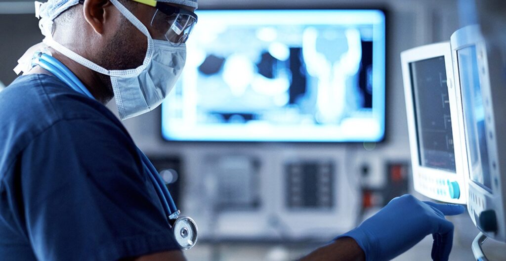 Doctor using medical equipment
