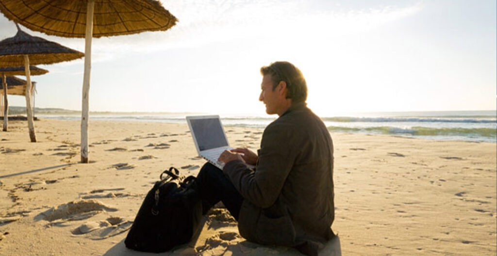 Man-workng-on-the-beach WFX