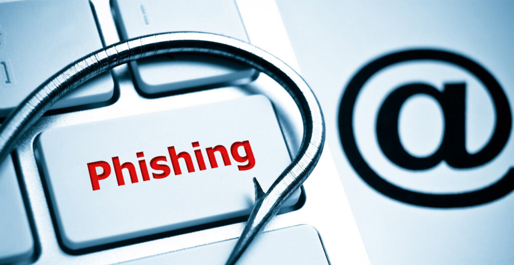 Phishing hook on keyboard
